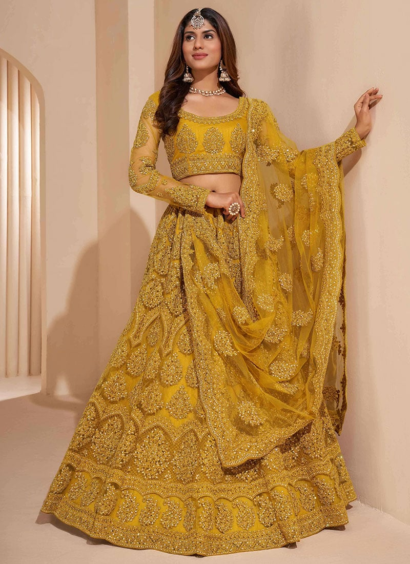 Mustard Net Embroidered N Stones Umbrella Lehenga Wedding Wear